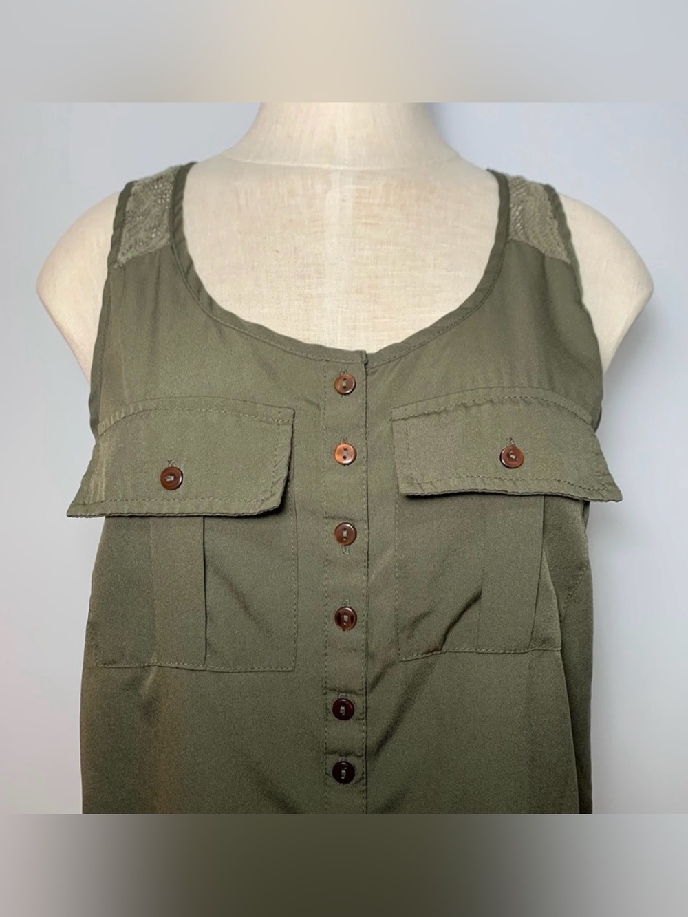 Charlotte Russe Sleeveless lace panel button front top w/ front pockets